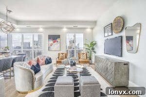 A beautifully staged living room with modern furniture, natural light, and inviting decor, illustrating how professional staging enhances a home's appeal.