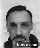 Image of a man wanted in a real estate fraud investigation by Toronto Police Services.