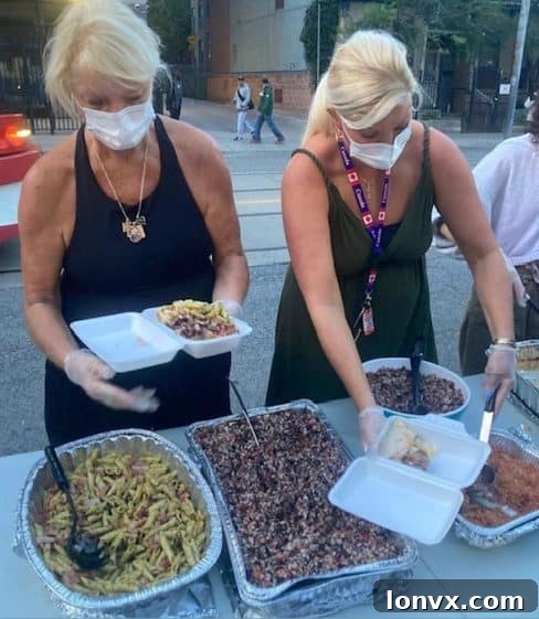 Ashlee and Linda Shutt handing out meals to the community