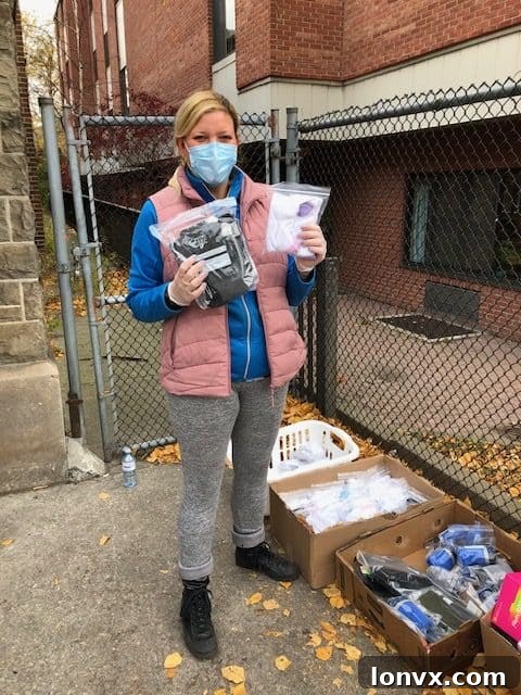 Ashlee Shutt handing out hygiene kits to the community