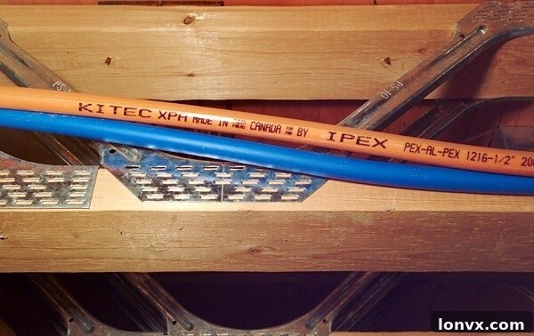 Kitec plumbing in a condominium utility closet.