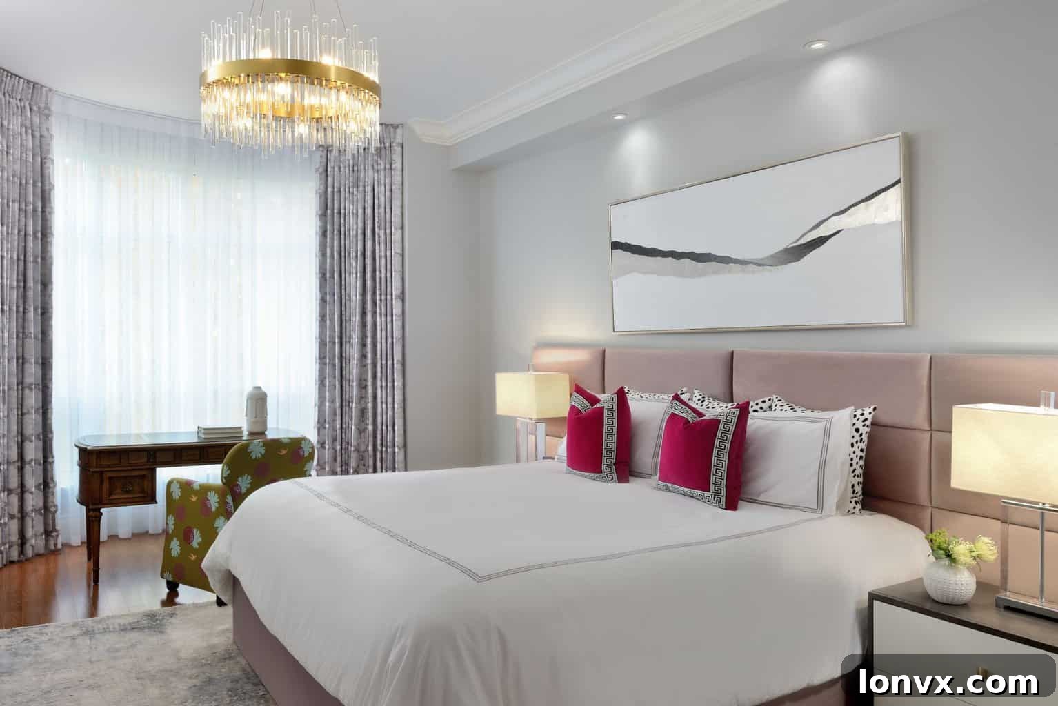 A cozy bedroom featuring a vintage writing desk and a floral accent chair. The room harmonizes traditional and modern elements.