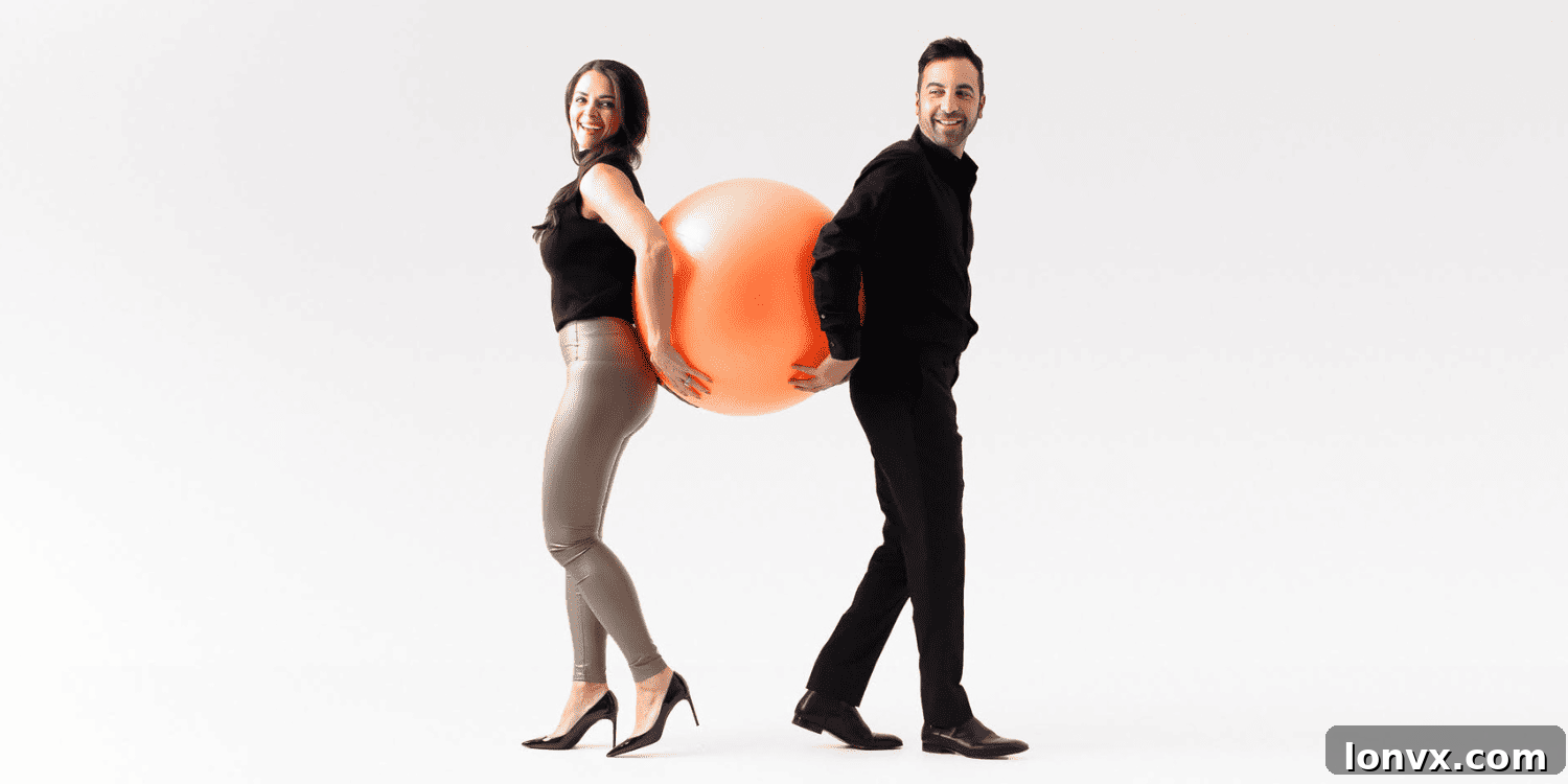 Nicki and Ryan Serravalle, co-founders of Revel Realty, photographed by Jennifer Blakeley, embodying their innovative real estate brand and leadership.