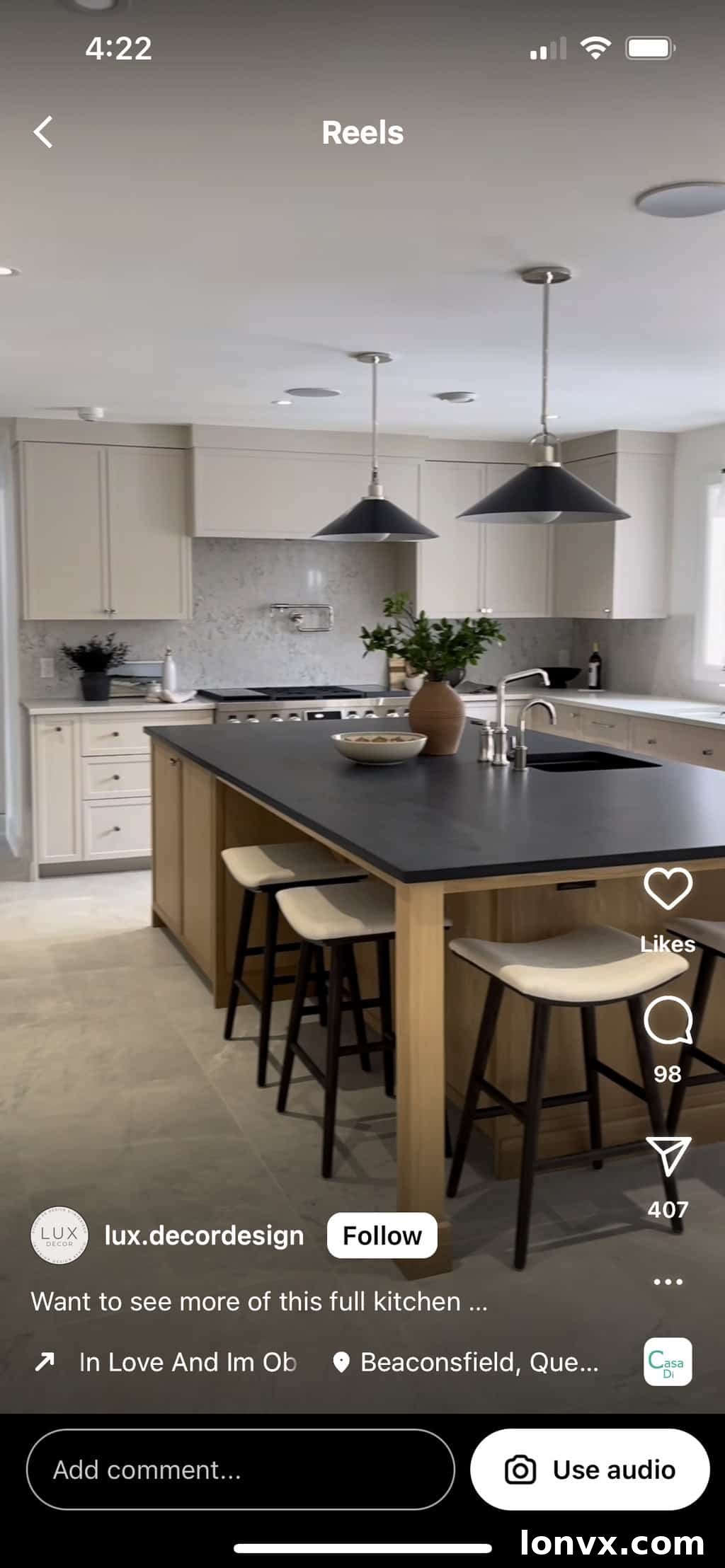 Real estate agent showcasing a luxury kitchen on Instagram Reels with the 'I'm Obsessed' trending sound