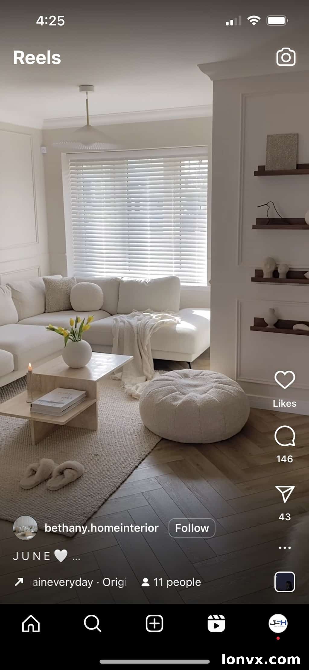 Real estate agent demonstrating a serene living room on Instagram Reels with the 'Heaven' trending sound