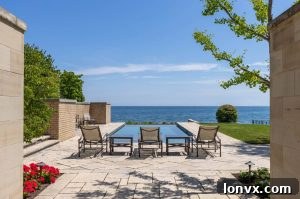 Luxurious living room of the Oakville lakefront mansion, featuring elegant furnishings and expansive views, highlighting the interior design.
