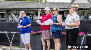 CLAR golf tournament participants gather for a photo after a successful fundraising event.