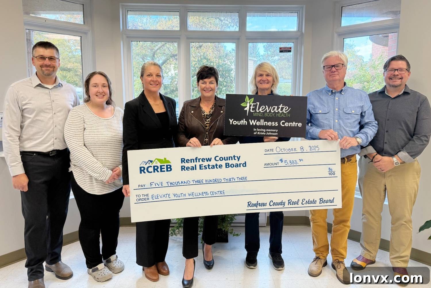 Renfrew County Real Estate Board members and volunteers celebrating their charity golf tournament success