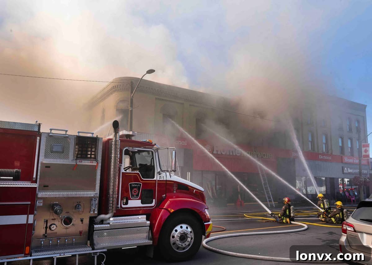 Firefighters battling a blaze at the Lakefield Home Hardware store