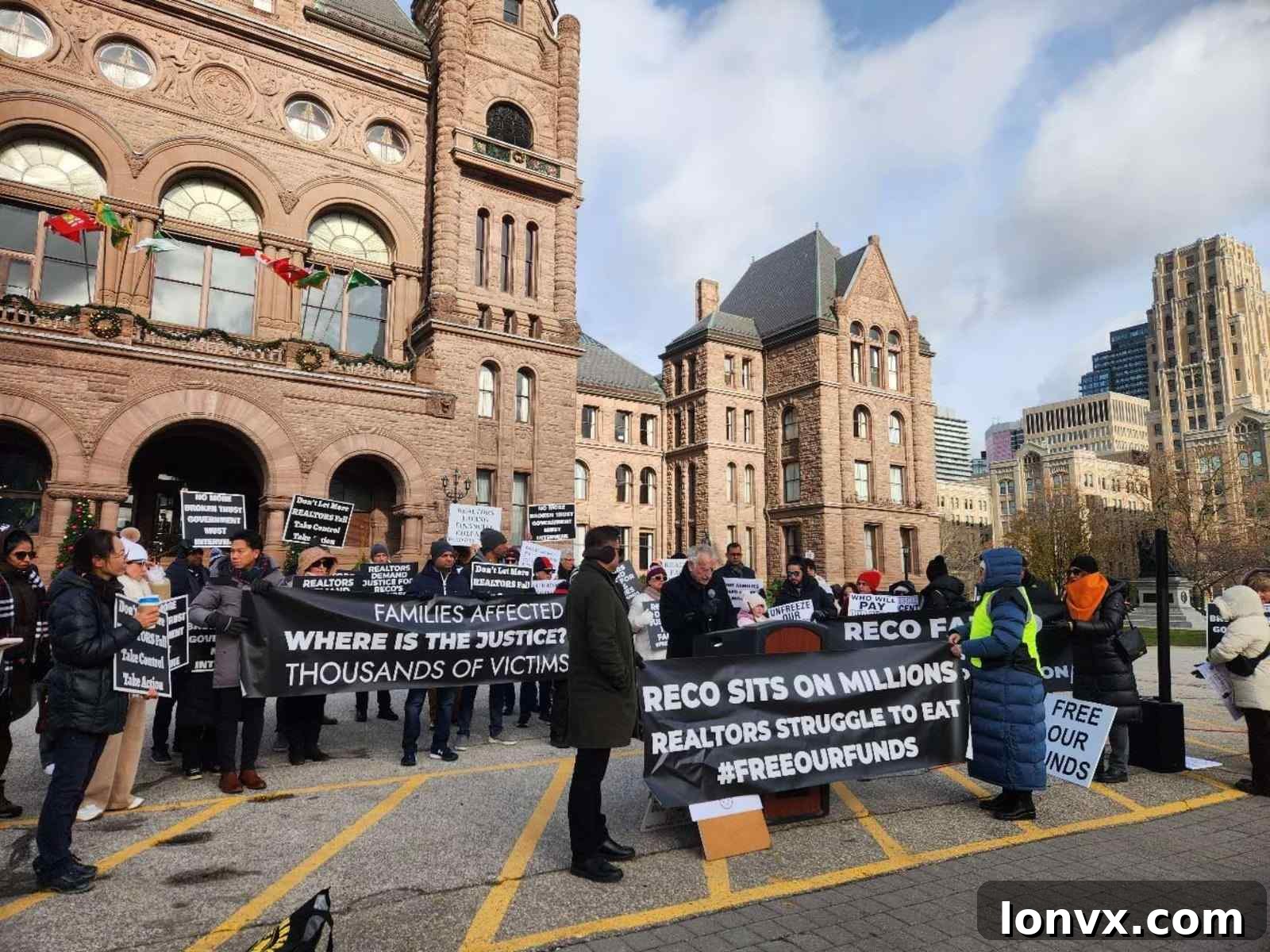 Real estate agents protest outside Queen's Park in Toronto, holding signs demanding justice for unpaid commissions from the iPro Realty Ltd. fraud scandal.
